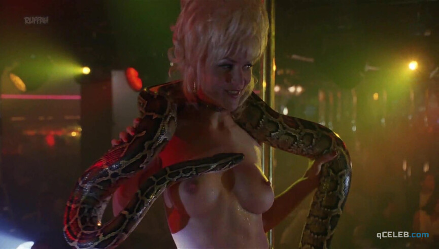 3. Barbara Alyn Woods nude – Striptease (1996)