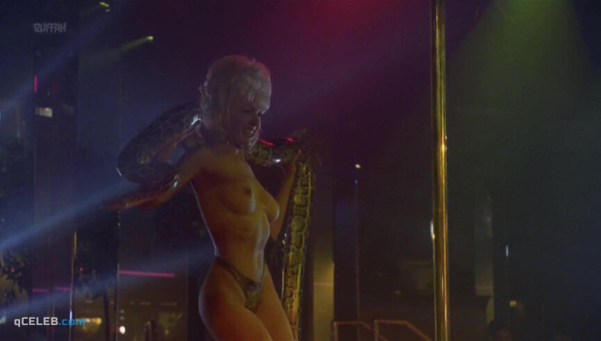 4. Barbara Alyn Woods nude – Striptease (1996)