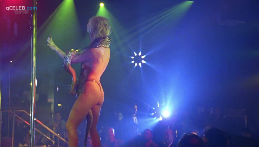 5. Barbara Alyn Woods nude – Striptease (1996)