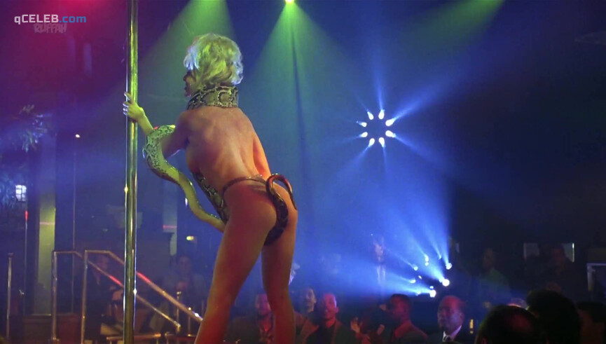 6. Barbara Alyn Woods nude – Striptease (1996)