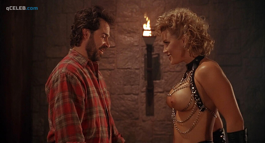 1. Kiara Hunter nude – Bordello of Blood (1996)