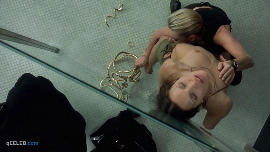 1. Rebecca Romijn nude – Femme Fatale (2002)