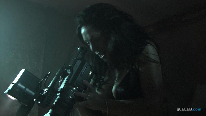 3. Emily Booth sexy – Evil Aliens (2005)